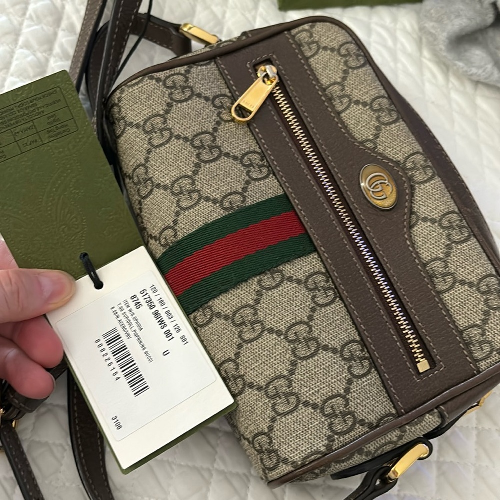 mini shoulder bag is presented in  beige and ebony GG Supreme canvas,